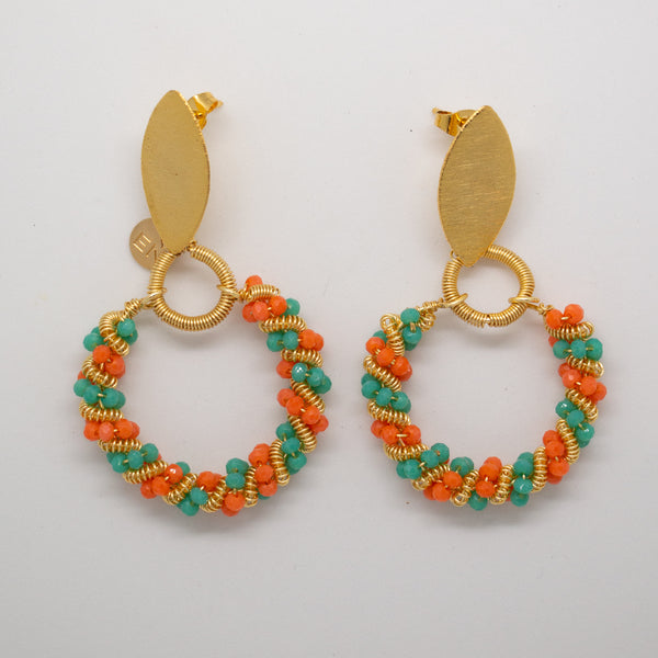 AROS CIRCULARES CON CRISTALES ENTORCHADOS